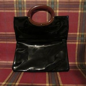 Black polyvinyl vintage handbag